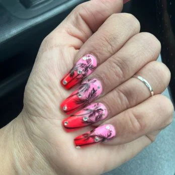 Pink floral nail art created at 360 Nails